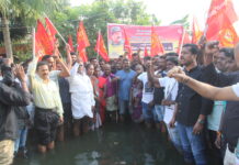 மழைநீரை அகற்றக்கோரி திருநின்றவூரில் ஆர்ப்பாட்டம்